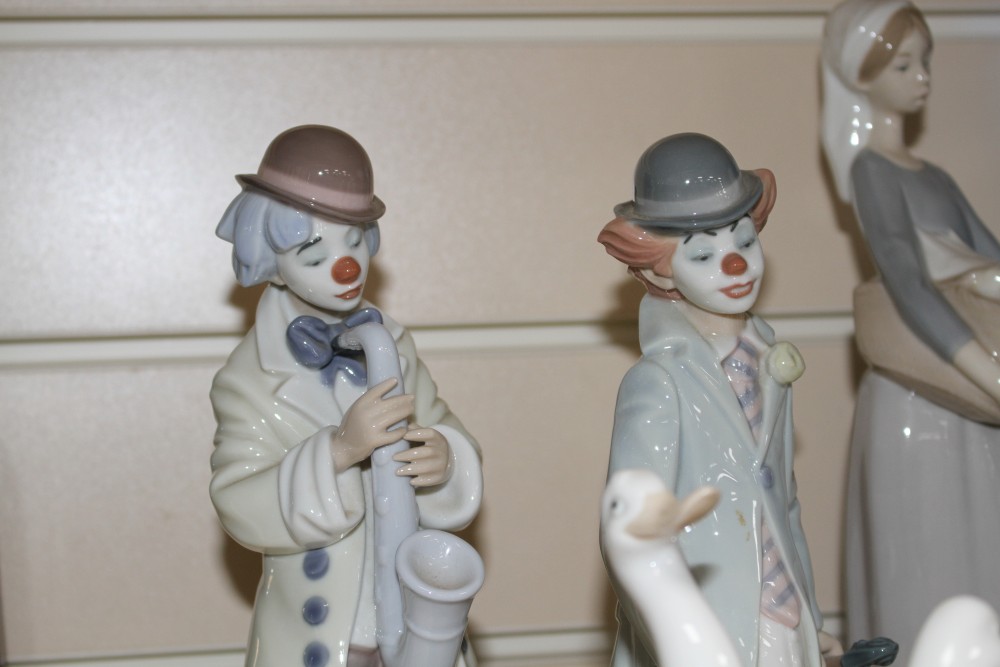 Five assorted Lladro figures and three Nao geese